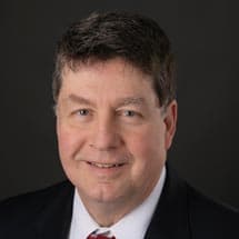 Portrait of Dan Badea, Vice President and Commercial Lender at Magyar Bank, smiling warmly.