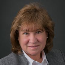 Portrait of Jean McDonnell, Vice President and Commercial Lender at Magyar Bank, smiling warmly.